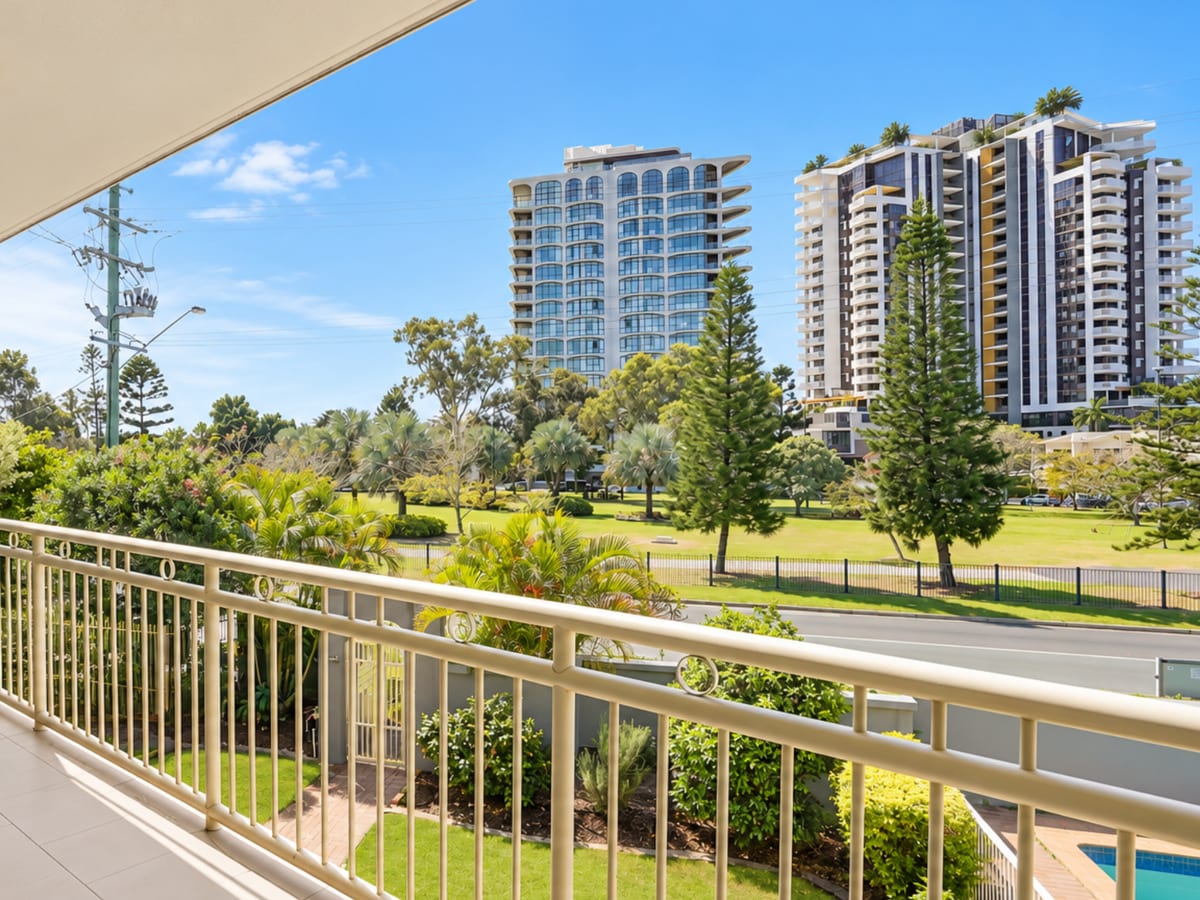 View from the apartment's balcony across Chevron Island Park to the towers beyond