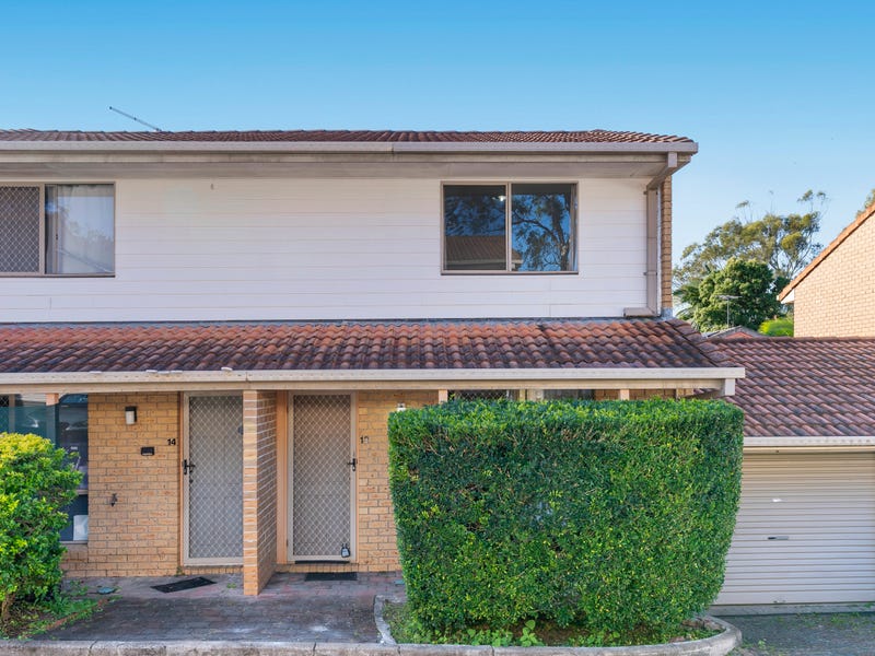 Front of 13/136 Smith Rd, Woodridge: a two-storey brick townhouse